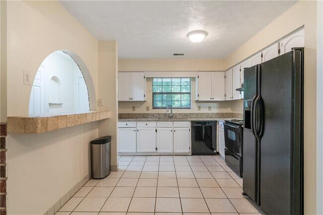 Foto del edificio - 5000 Village Green Way