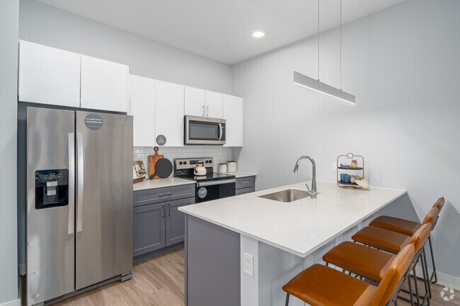 Plano de planta A7, 1 dormitorio, 1 baño con estudio - 915 pies cuadrados - Cocina - The Residences at Payton Place
