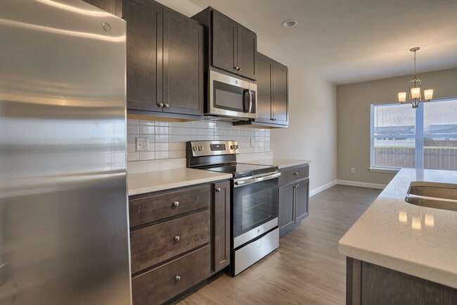 Building Photo - Summer Sage Condos