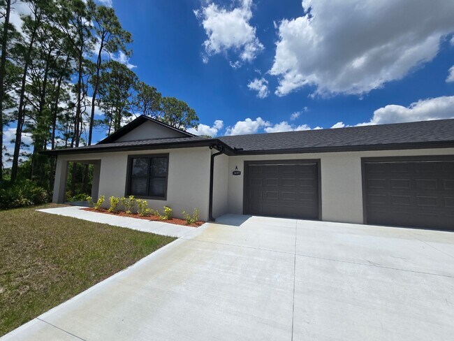 Building Photo - Brand-New 4-Bed Beauty with Attached Garage in Palm Bay – Modern Comfort, Prime Convenience!