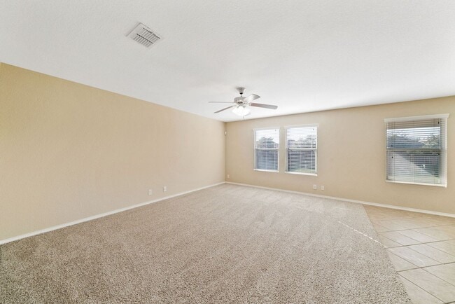Building Photo - 4 Bedroom 2.5 Bathroom Champions Park Subd...