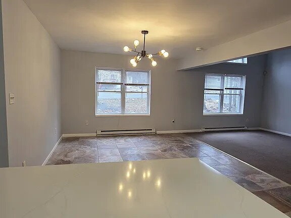 Building Photo - Spacious 4-bedroom, 2-bathroom contemporary home is available for rent