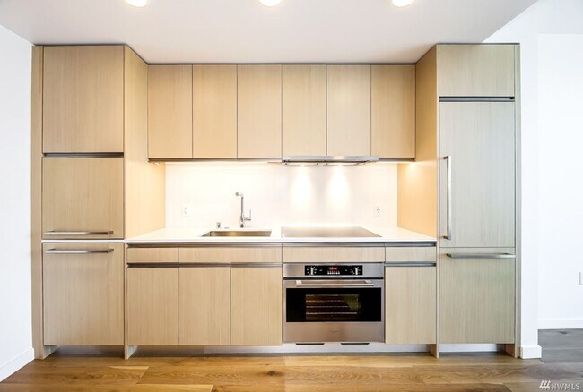 Building Photo - Spacious NW-Facing 1 Bed + Den, 1 Bath Luxury High-Rise Condo in Seattle's Denny Triangle – Nexus
