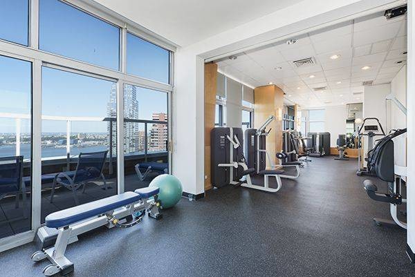 The gym at the top floor with city & river view! - 500 W 43rd St