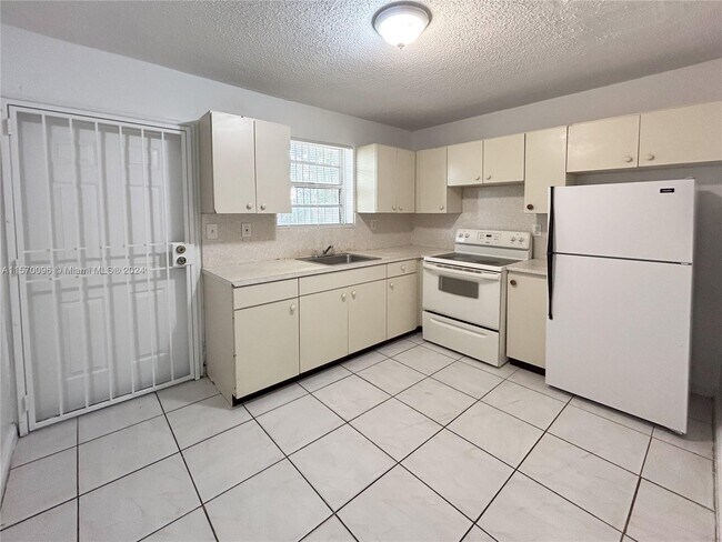 Building Photo - 220 NW 59th St