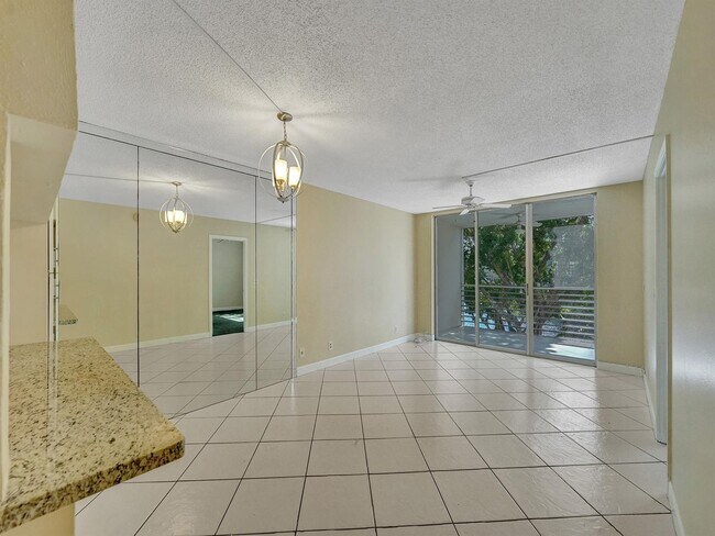 Building Photo - 9420 Poinciana Plz