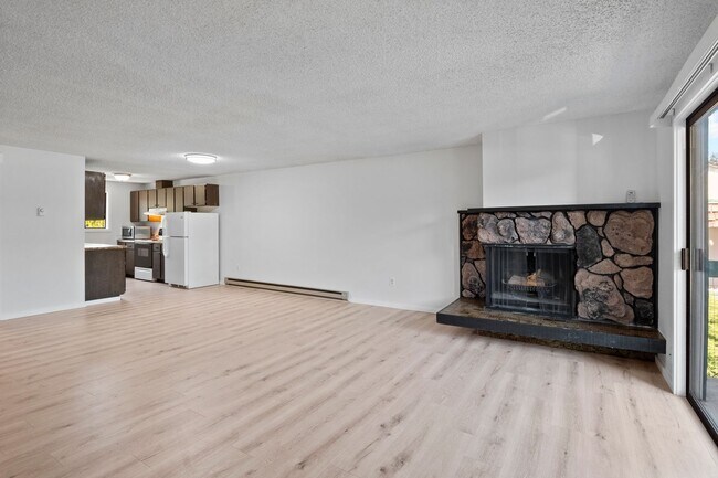Building Photo - Spacious And Nicely Updated 2 bed 1 Bath Condo unit w/ full size laundry