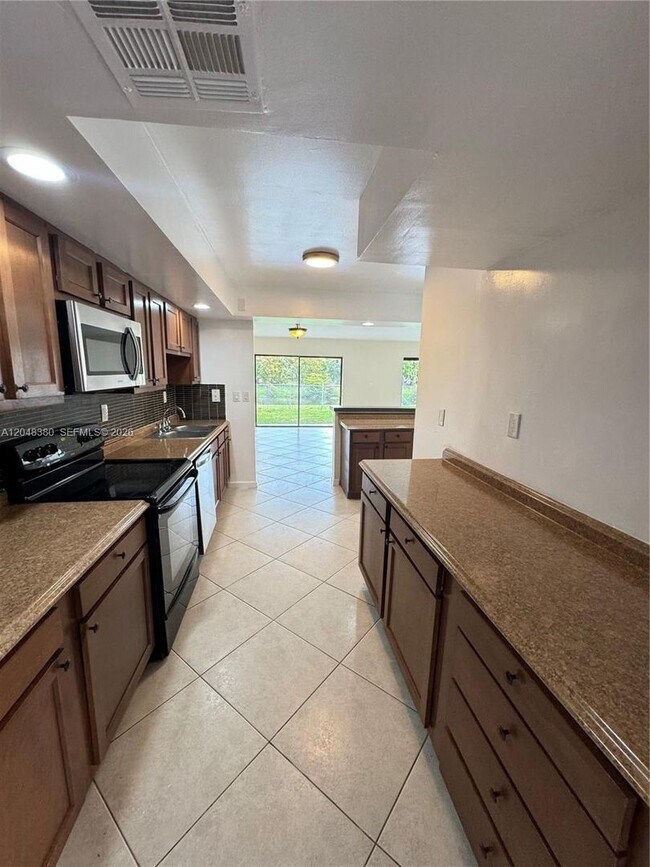 Photo - 3167 Coral Springs Drive 123, Coral Springs, FL 33065 - 3801 House