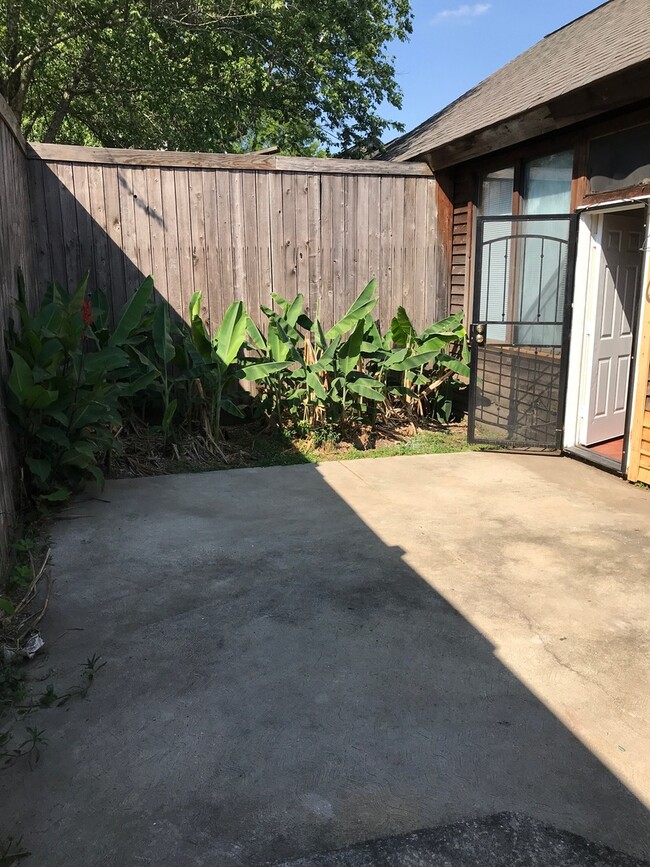 Building Photo - Bungalow with Private Fenced Back Yard