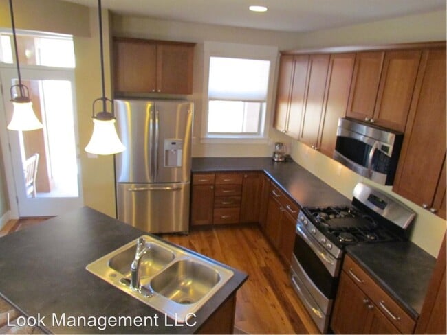 Building Photo - 4 br, 4 bath House - 9067 E 35th Ave