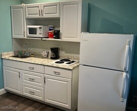 Building Photo - 25000 Tamiami Trl