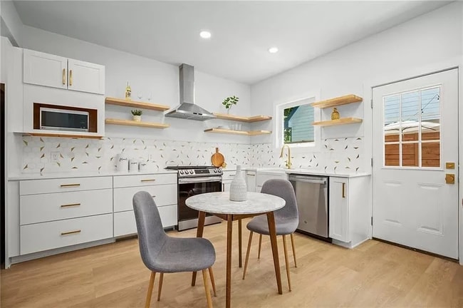 Stainless steel appliances include Gas Stove, Refrigerator, and efficient Dishwasher. - 5402 Duval St