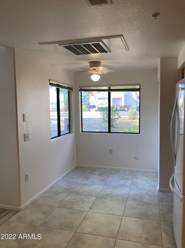 Building Photo - 9455 E Raintree Dr