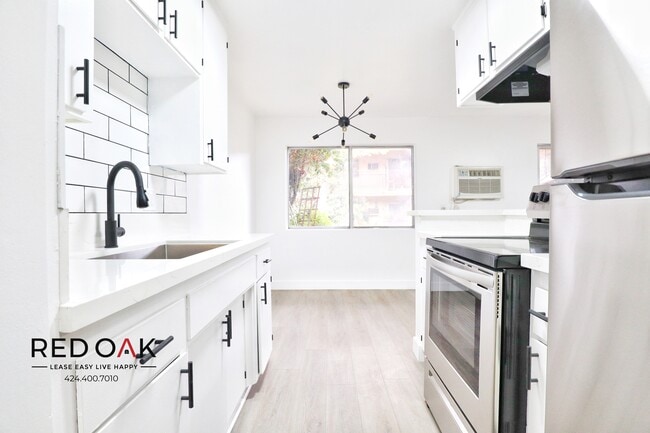 Building Photo - 211 S Ave 57 #12