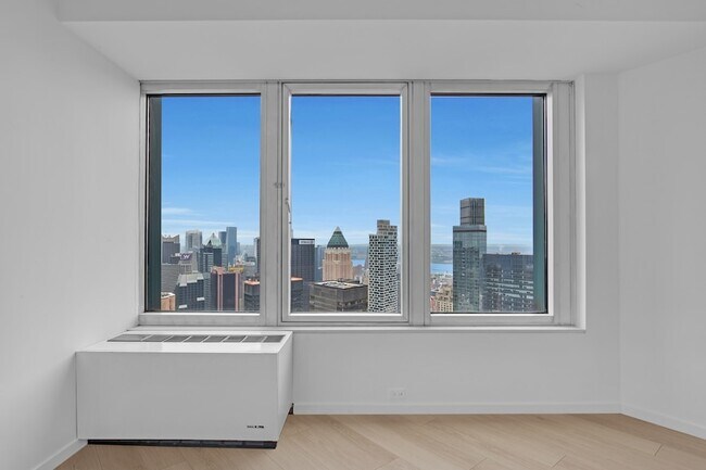 Foto del edificio - 150-156 W 56th St