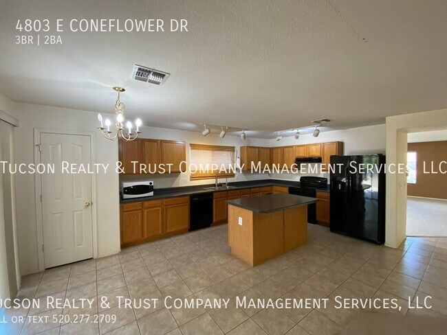 Building Photo - Three Bedroom Plus A Den - Move In Ready