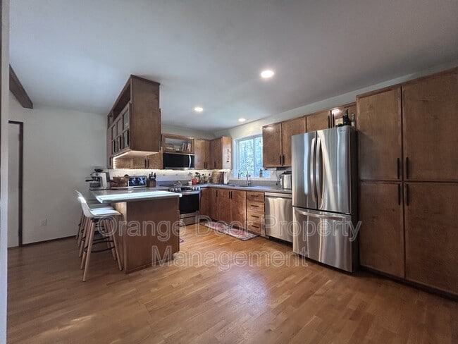 Building Photo - 9904 42nd St Ct NW