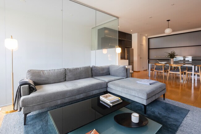 Abundant light with floor to ceiling windows and glass walls. - 2250 11th St NW