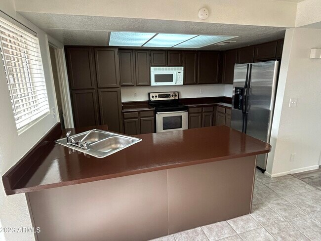 Foto del edificio - 5827 N 59th Dr