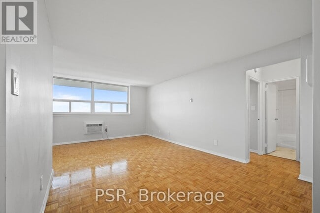Building Photo - 111-2111 Raglan Ave