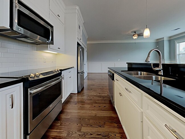 Building Photo - Heights Oasis: Spacious Condo Living in Pr...