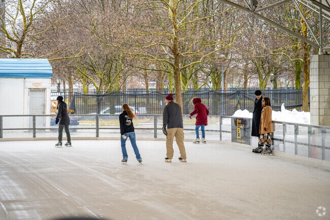 Downtown residents take advantage of the Headwaters Park Ice Rink.