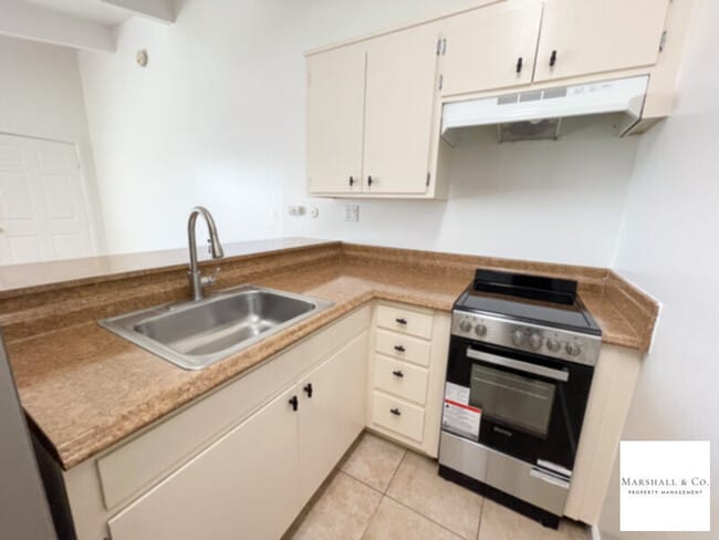 Building Photo - GOOD SIZED STUDIO - NEW LAMINATE HARDWOOD FLRS, NEW KITCHEN + BATH FEATURES!