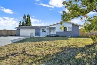 Building Photo - 7902 Canna Dr