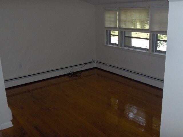 Building Photo - A 2nd floor 2 bedroom, 1 bath apartment