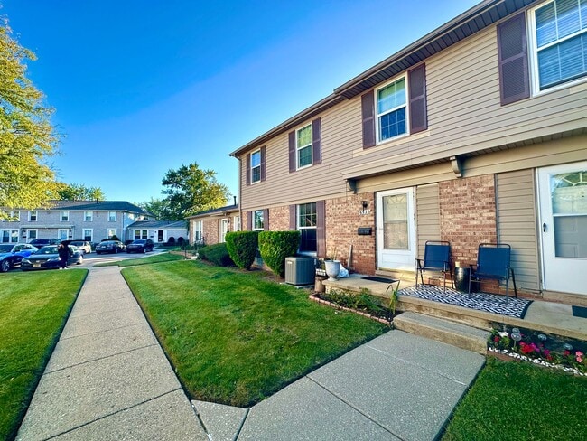 Photo - Open-Concept 3BR Condo with Finished Basement in Canton