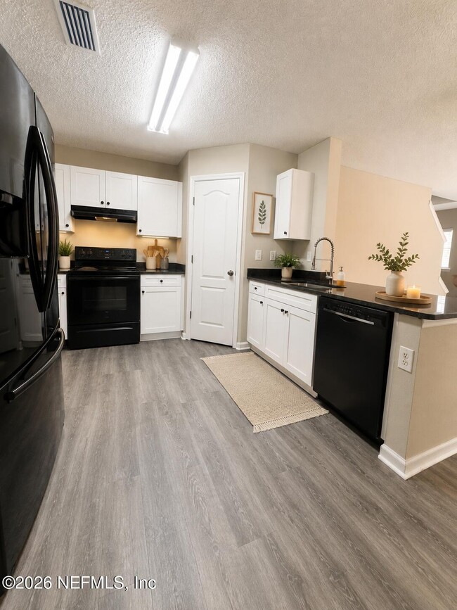 Building Photo - 7772 Playschool Ln