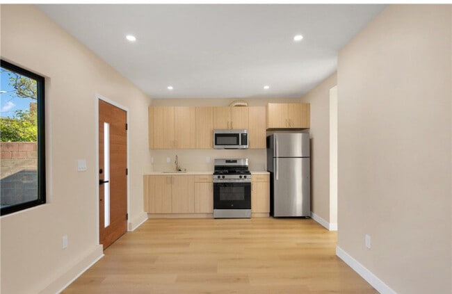 Building Photo - 10509 Dempsey Ave