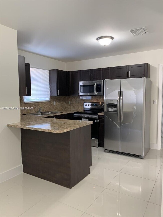 Building Photo - 1756 Northwest 66th Street Apt #1756, Miam...
