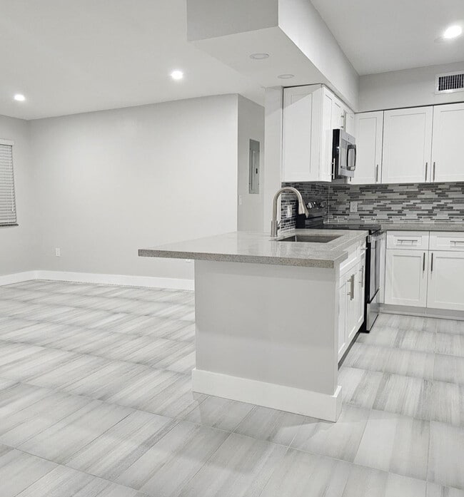 Building Photo - 1680 NW 128th St