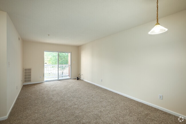 3BR, 2BA - 966SF-Living Room - Jamestown Commons