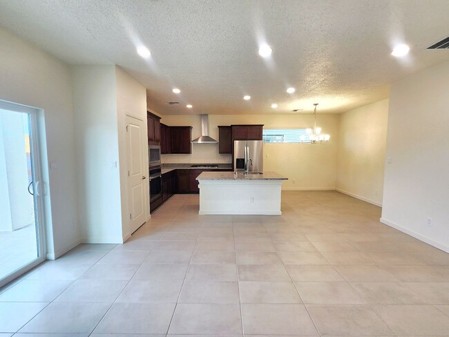 Building Photo - Brand-New Construction Townhome – Never Li...