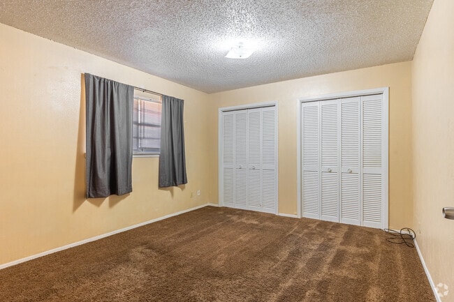 2BR, 1BA - 825SF - Primary Bedroom - Eastgate Apartments