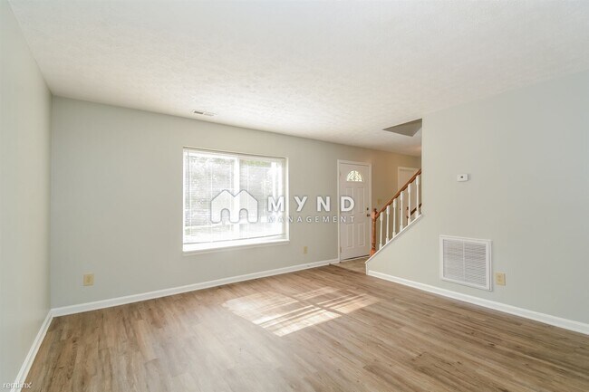 Building Photo - 4 br, 2.5 bath House - 7925 Mcguire Dr