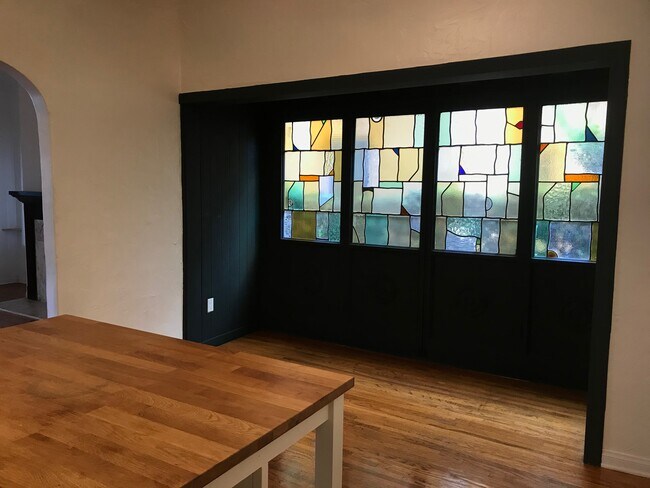 Dining area with stained glass windows - 1453 S Canfield Ave