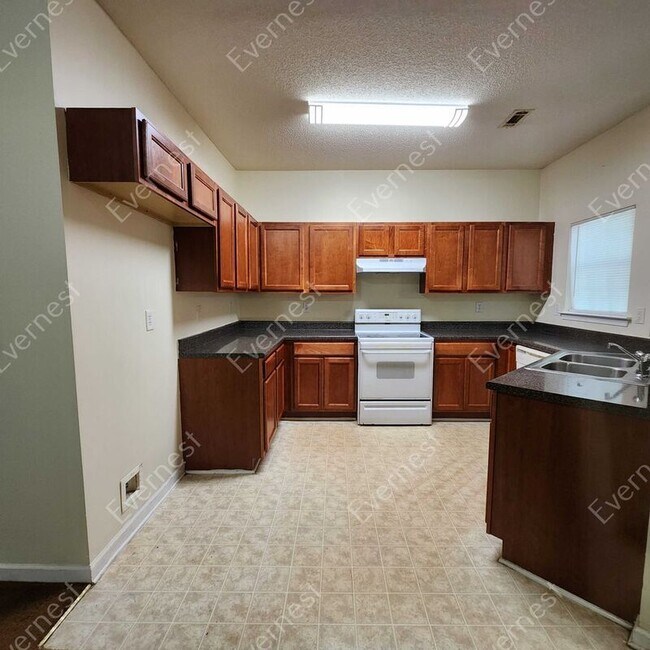Building Photo - 7688 Creekside Ln