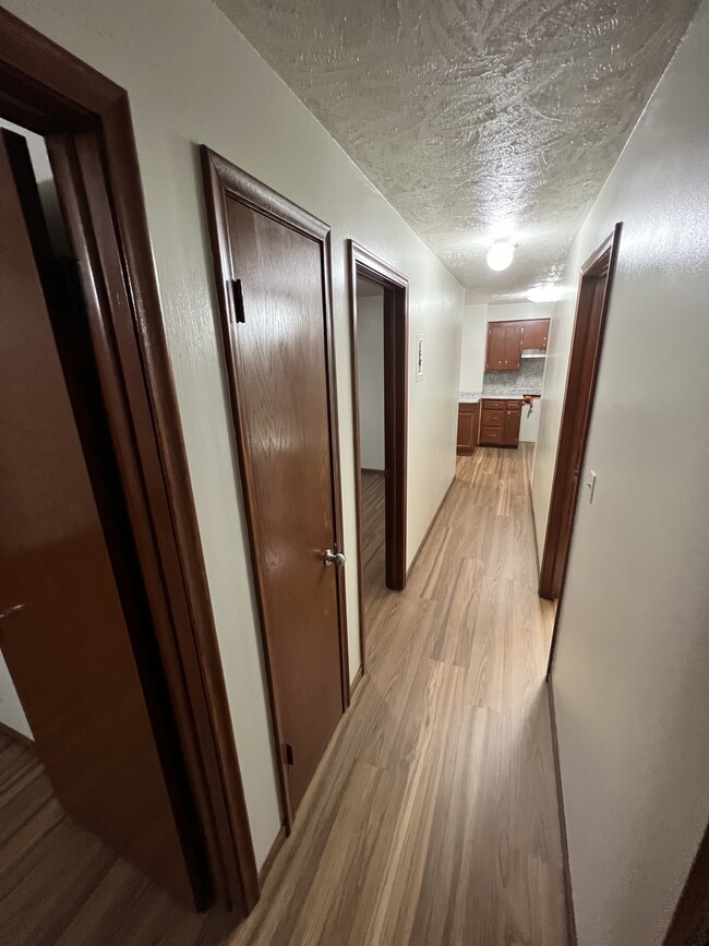 Hallway from bedrooms - 120 Mississippi Place NE