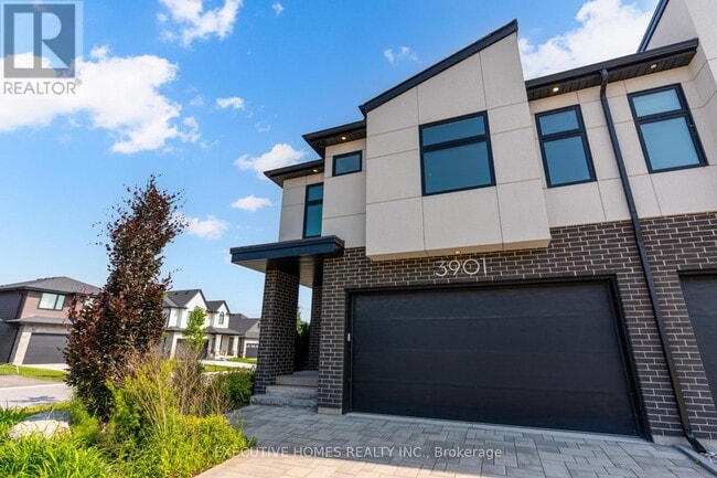 Building Photo - 3901 Mitchell Cres