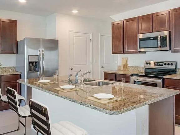 Building Photo - Welcome to this beautiful 4-bedroom, 2.5-b...