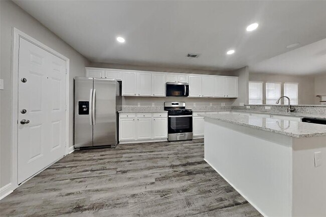 Foto del edificio - 34 Orchid Grove Pl