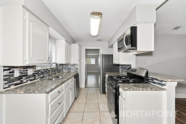 Building Photo - 4BR/2BA | Newly Renovated Single Family Home | 1-Car Garage Parking | Fenced backyard!