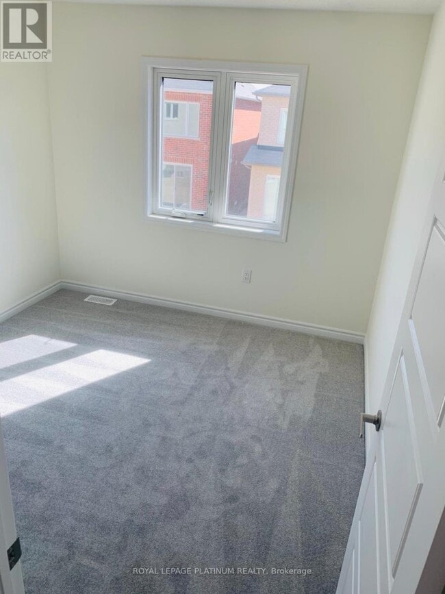 Photo du bâtiment - 1366 Sycamore Garden