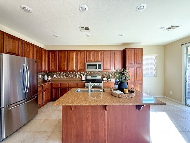 Building Photo - Welcome to this 5-Bedroom Henderson Home