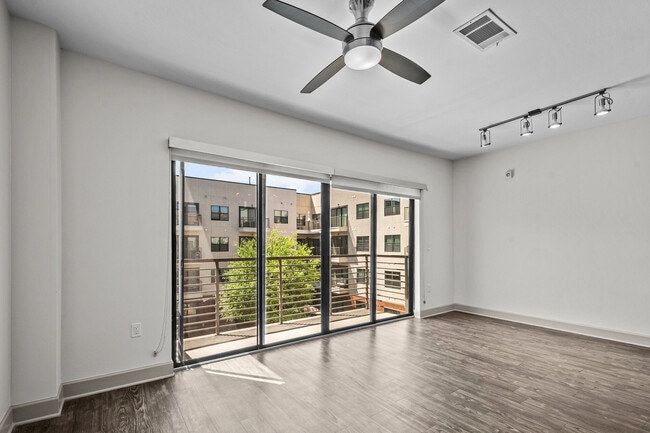 Bright living space with private balcony views - Maple at Med Center
