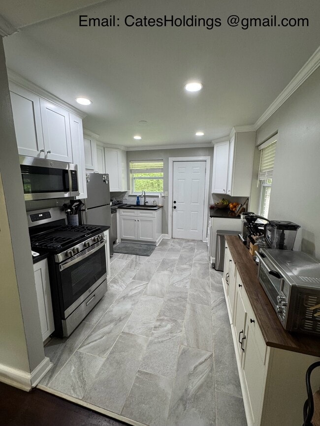 Building Photo - 4848 Gilmore Dr