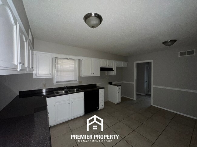 Building Photo - Charming 3BR Bartlett Home w/ Rustic Fireplace, Covered Patio & Fenced Yard